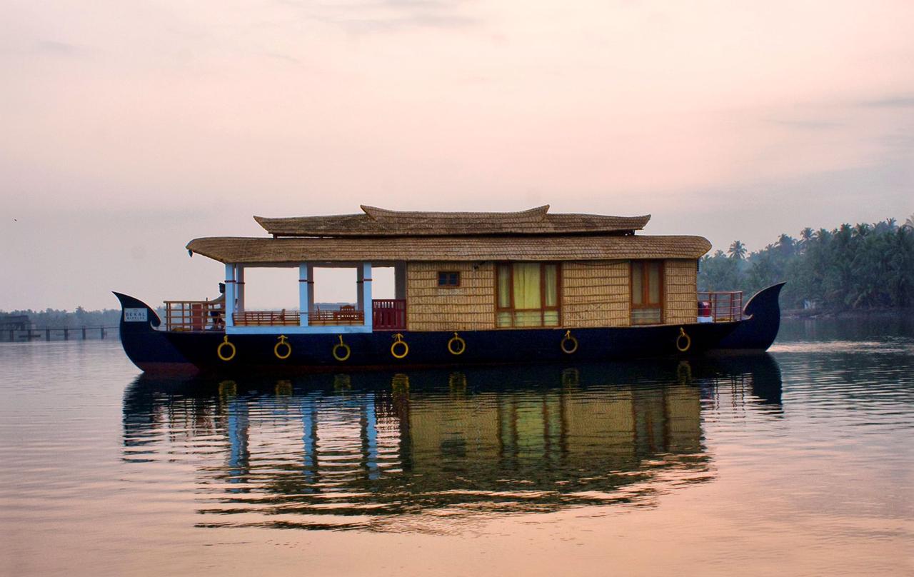 Romantic Monsoon Houseboat Cruise in North Kerala